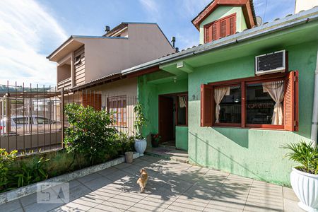 Casa à venda com 103m², 3 quartos e 1 vaga Casa à venda com 103m², 3 quartos e 1 vagaFachada