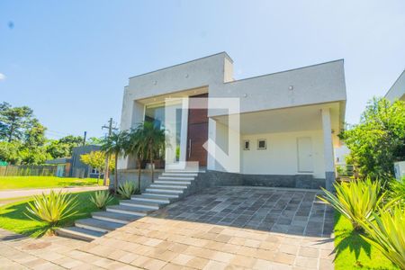 Casa de condomínio à venda com 250m², 3 quartos e 2 vagas Casa de condomínio à venda com 250m², 3 quartos e 2 vagasFachada
