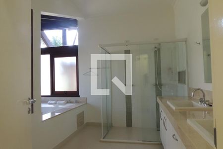 Casa de condomínio à venda com 410m², 4 quartos e 3 vagasBanheiro da Suíte 4