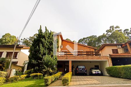 Casa de condomínio à venda com 400m², 4 quartos e 4 vagas Casa de condomínio à venda com 400m², 4 quartos e 4 vagasFachada