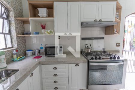 Casa à venda com 280m², 4 quartos e 4 vagas Casa à venda com 280m², 4 quartos e 4 vagasCozinha