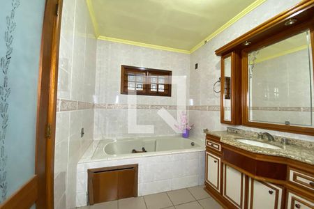 Casa à venda com 411m², 4 quartos e 3 vagasBanheiro da Suíte 3