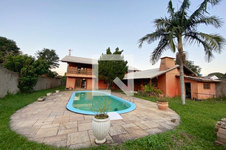 Casa à venda com 411m², 4 quartos e 3 vagasPiscina