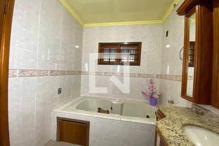 Casa à venda com 411m², 4 quartos e 3 vagasBanheiro da Suíte 3