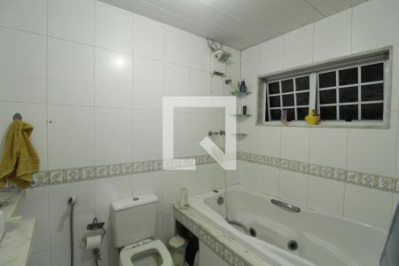 Casa à venda com 240m², 4 quartos e 4 vagasBanheiro - Suíte