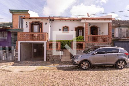 Casa à venda com 200m², 3 quartos e 2 vagas Casa à venda com 200m², 3 quartos e 2 vagasFachada