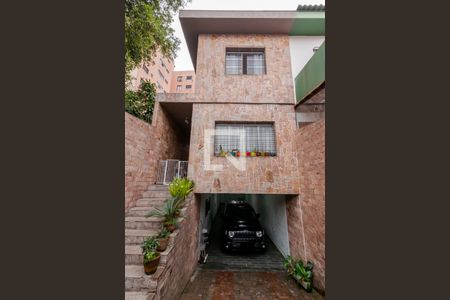 Casa à venda com 210m², 4 quartos e 4 vagas Casa à venda com 210m², 4 quartos e 4 vagasFachada