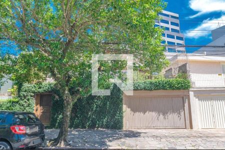 Casa à venda com 350m², 4 quartos e 4 vagas Casa à venda com 350m², 4 quartos e 4 vagasFachada