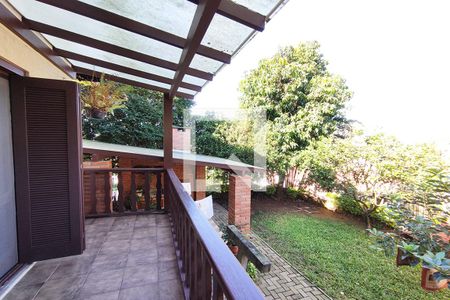 Casa à venda com 350m², 4 quartos e 2 vagasSacada da Sala de TV
