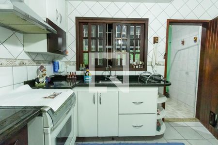 Casa à venda com 100m², 4 quartos e 2 vagas Casa à venda com 100m², 4 quartos e 2 vagasCozinha