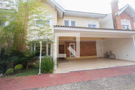 Casa de condomínio à venda com 290m², 4 quartos e 3 vagasFachada da Casa