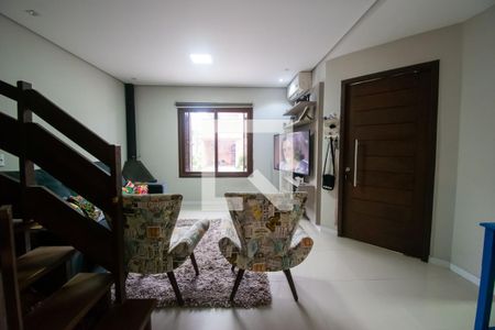 Sala de casa de condomínio para alugar com 4 quartos, 193m² em Guarujá, Porto Alegre