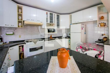 Casa à venda com 150m², 3 quartos e 3 vagas Casa à venda com 150m², 3 quartos e 3 vagasCozinha