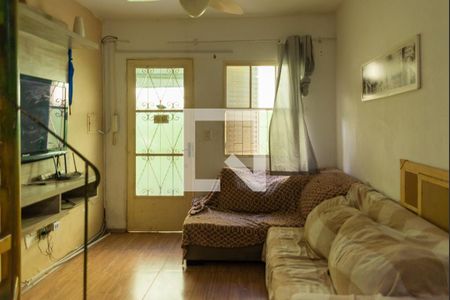 Sala de casa de condomínio à venda com 2 quartos, 65m² em São José, Porto Alegre