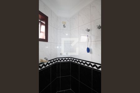 Casa à venda com 411m², 4 quartos e 5 vagasBanheiro da Suíte 1