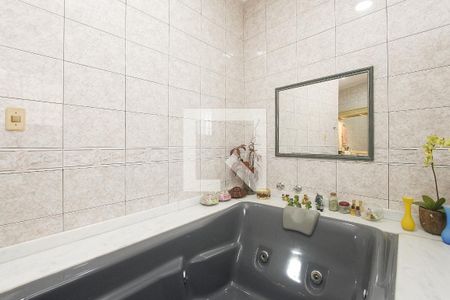 Casa à venda com 294m², 4 quartos e 2 vagasBanheiro suite 1