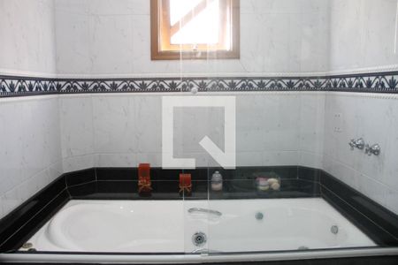 Casa à venda com 315m², 4 quartos e 5 vagasBanheiro da Suíte 1