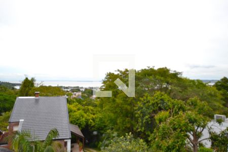 Casa à venda com 400m², 5 quartos e 4 vagasVaranda das Suites 1 e 2 - Com vista para o Guaíba