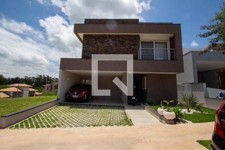 Casa de condomínio à venda com 339m², 4 quartos e 4 vagas Casa de condomínio à venda com 339m², 4 quartos e 4 vagasFachada