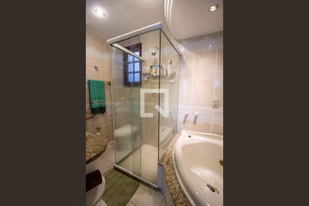 Casa de condomínio à venda com 310m², 4 quartos e 2 vagasBanheiro da Suíte 1