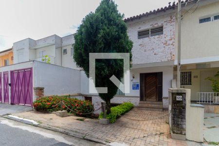Casa à venda com 190m², 3 quartos e 2 vagas Casa à venda com 190m², 3 quartos e 2 vagasFachada