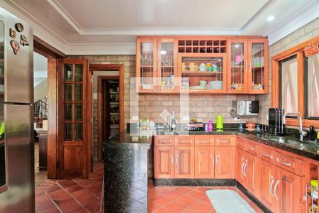 Casa de condomínio à venda com 396m², 4 quartos e 4 vagas Casa de condomínio à venda com 396m², 4 quartos e 4 vagasCozinha