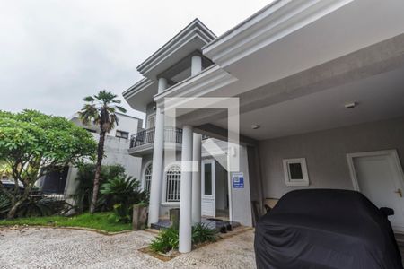 Casa de condomínio à venda com 516m², 5 quartos e 7 vagasVista da Rua