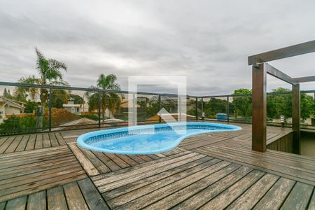 Casa de condomínio à venda com 344m², 4 quartos e 3 vagas Casa de condomínio à venda com 344m², 4 quartos e 3 vagasÁrea externa