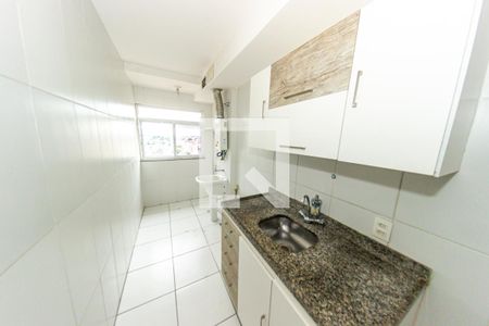 Apartamento à venda com 48m², 2 quartos e 1 vaga Apartamento à venda com 48m², 2 quartos e 1 vagaCozinha e Área de Serviço