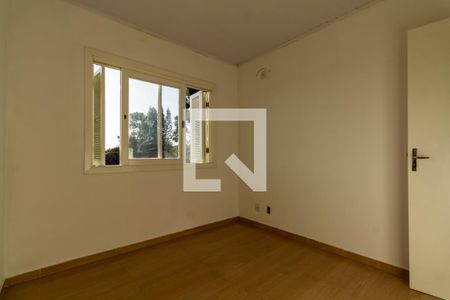 quarto 1 de casa de condomínio para alugar com 3 quartos, 101m² em Campo Novo, Porto Alegre
