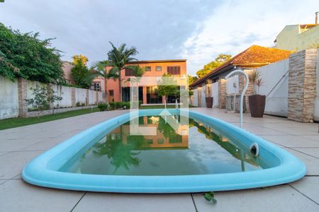 Casa à venda com 218m², 4 quartos e 4 vagasÁrea comum - Piscina