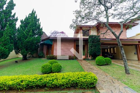 Casa de condomínio à venda com 550m², 4 quartos e 7 vagas Casa de condomínio à venda com 550m², 4 quartos e 7 vagasFachada