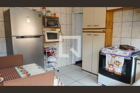 Casa à venda com 132m², 2 quartos e 2 vagas Casa à venda com 132m², 2 quartos e 2 vagasCozinha