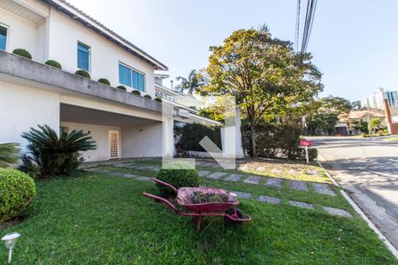 Casa de condomínio à venda com 320m², 5 quartos e 4 vagas Casa de condomínio à venda com 320m², 5 quartos e 4 vagasGaragem