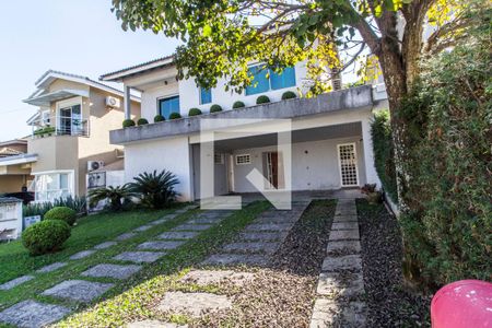 Casa de condomínio à venda com 320m², 5 quartos e 4 vagas Casa de condomínio à venda com 320m², 5 quartos e 4 vagasGaragem