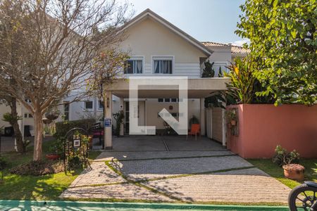 Casa de condomínio à venda com 205m², 3 quartos e 4 vagas Casa de condomínio à venda com 205m², 3 quartos e 4 vagasFachada