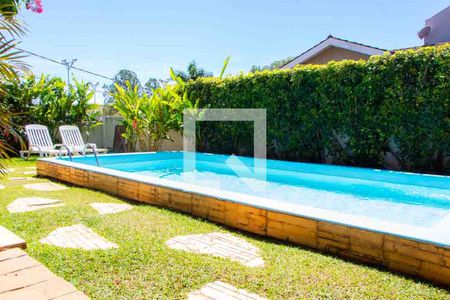 Casa de condomínio à venda com 208m², 4 quartos e 5 vagas Casa de condomínio à venda com 208m², 4 quartos e 5 vagasÁrea Externa