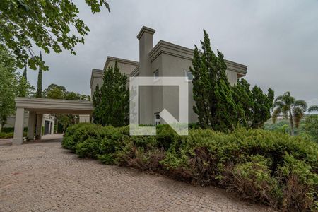 Casa de condomínio à venda com 620m², 5 quartos e 10 vagas Casa de condomínio à venda com 620m², 5 quartos e 10 vagasFachada