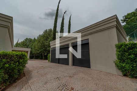 Casa de condomínio à venda com 620m², 5 quartos e 10 vagas Casa de condomínio à venda com 620m², 5 quartos e 10 vagasGaragem