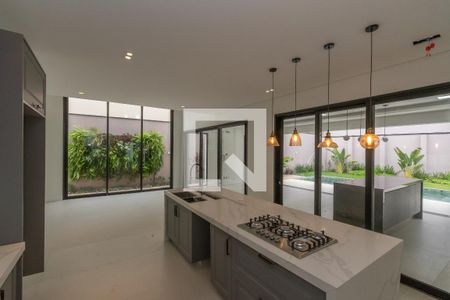 Casa de condomínio à venda com 440m², 4 quartos e 4 vagas Casa de condomínio à venda com 440m², 4 quartos e 4 vagasCozinha