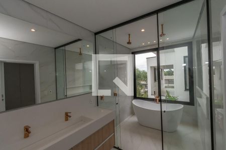 Casa de condomínio à venda com 440m², 4 quartos e 4 vagas Casa de condomínio à venda com 440m², 4 quartos e 4 vagasBanheiro Suite Master