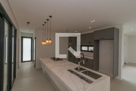 Casa de condomínio à venda com 440m², 4 quartos e 4 vagas Casa de condomínio à venda com 440m², 4 quartos e 4 vagasCozinha