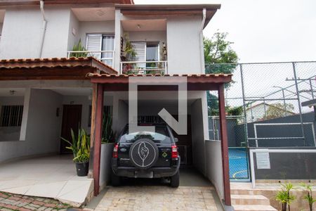 Casa de condomínio à venda com 68m², 2 quartos e 1 vaga Casa de condomínio à venda com 68m², 2 quartos e 1 vagaFachada da casa