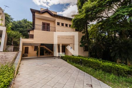 Casa de condomínio à venda com 437m², 4 quartos e 5 vagas Casa de condomínio à venda com 437m², 4 quartos e 5 vagasFachada
