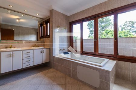 Casa de condomínio à venda com 437m², 4 quartos e 5 vagas Casa de condomínio à venda com 437m², 4 quartos e 5 vagasBanheiro da Suíte 4