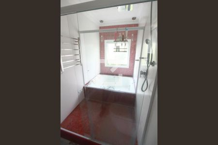 Casa de condomínio à venda com 308m², 4 quartos e 2 vagasBanheiro Suíte 1