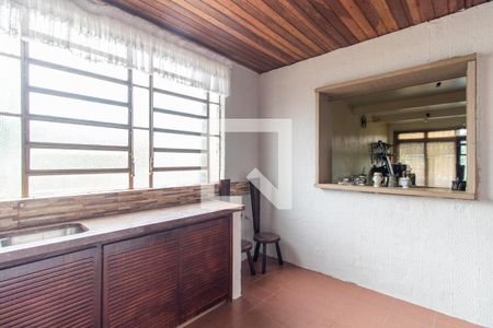 Casa à venda com 240m², 4 quartos e 5 vagas Casa à venda com 240m², 4 quartos e 5 vagasCozinha e Área de Serviço 2