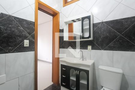 Banheiro suite de casa à venda com 3 quartos, 240m² em Sarandi, Porto Alegre