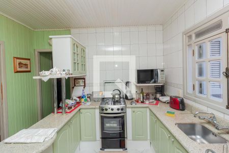 Casa à venda com 125m², 3 quartos e 3 vagas Casa à venda com 125m², 3 quartos e 3 vagasCozinha