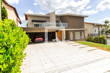 Casa de condomínio à venda com 554m², 4 quartos e 4 vagas Casa de condomínio à venda com 554m², 4 quartos e 4 vagasGaragem